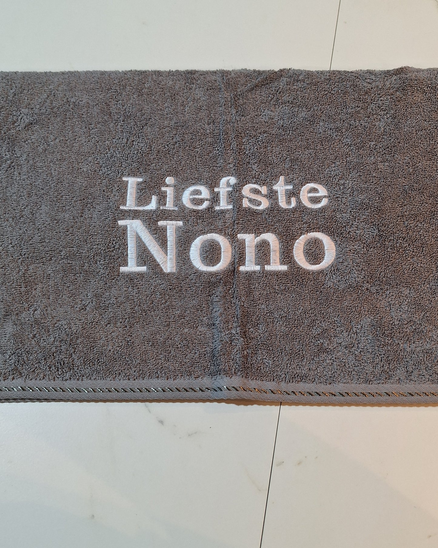 Handdoek met naam geborduurd
